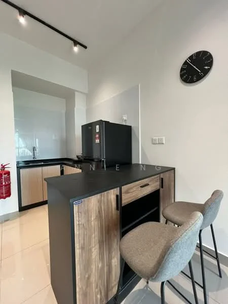 Kitchen features: black countertop, stainless-steel fridge, wood cabinetry, grey bar stools, white walls, recessed lighting, tile flooring, clock on wall; style: modern.