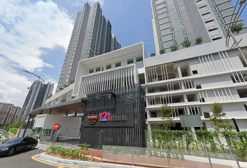Exterior type: high-rise condominium; features: modern facade with vertical fins, glass curtain wall, prominent entrance with signage, landscaped area with greenery, multiple storeys visible, parking deck, surrounded by urban environment; style: modern.