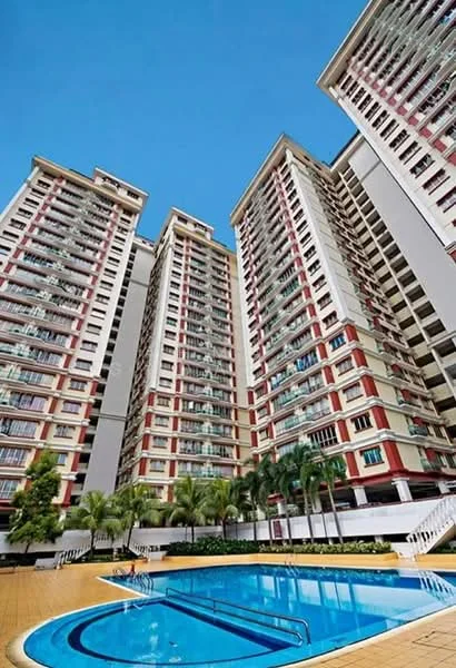 Exterior type: high-rise condominium; features: swimming pool, pool deck, multiple residential towers, balconies on each unit, landscaped garden area, palm trees, manicured lawn, glass windows, red and cream painted facade, elevated pool area; style: modern.