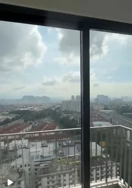 Room features: floor-to-ceiling windows, city view, balcony, glass railing, cloudy sky, urban landscape; view: city.