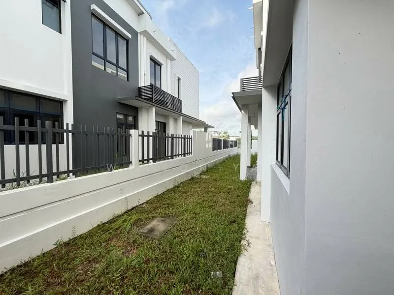 Exterior type: linked terrace house; features: grey painted facade, white painted facade, two-storey structure, manicured lawn, fenced perimeter, balcony on upper floor, concrete walkway, landscaped area, windows with black frames; style: modern.