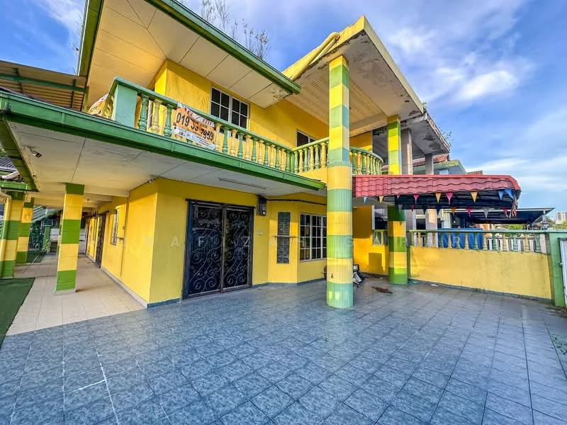 Exterior type: detached bungalow; features: yellow painted facade, green and yellow striped columns, flat roof, balcony with railing, tiled flooring, covered porch, multiple windows, decorative awning, manicured lawn, outdoor space with green grass; style: tropical-modern.