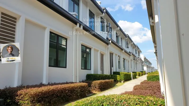 Exterior type: linked terrace house; features: white painted facade, two-storey, manicured lawn, hedge landscaping, paved walkway, multiple windows, clear blue sky, sunny weather; style: modern.