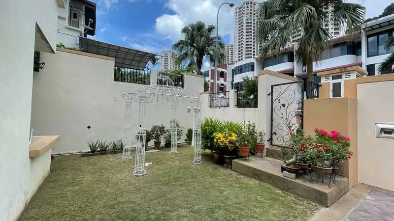 Exterior type: detached bungalow; features: manicured lawn, potted plants, decorative gazebo, stone pathway, fenced garden, surrounding palm trees, white painted wall, covered patio area, garden gate; style: modern.