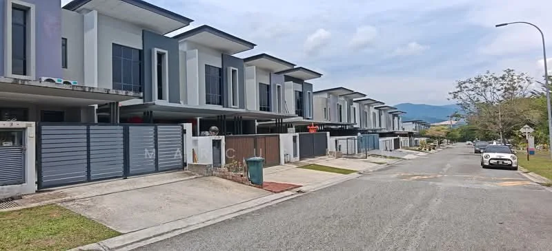 Exterior type: linked terrace house; features: modern facade with grey and white colors, multiple storeys, large windows, gated entrance, driveway with interlocking pavers, manicured landscaping, street view with mountain backdrop, visible parking spaces, sidewalk along the street, curbside garbage bin, adjacent to residential area; style: modern.