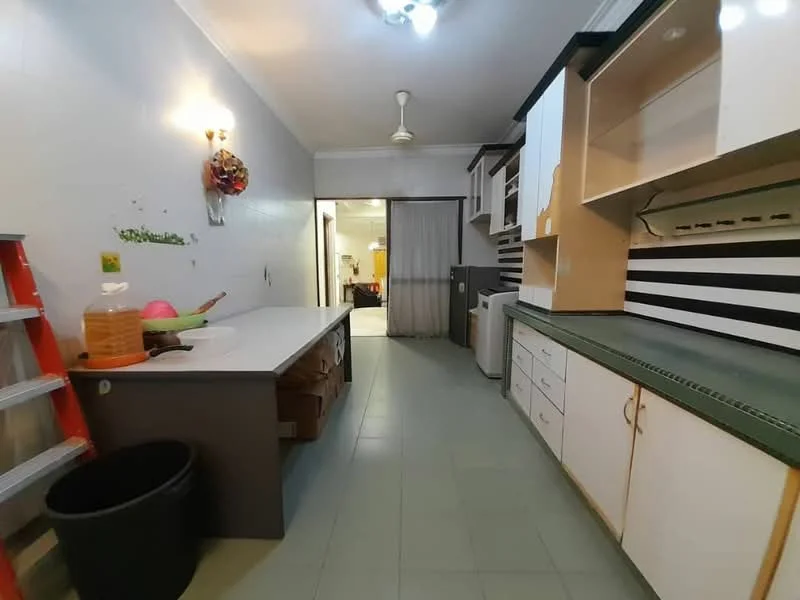 Kitchen features: white cabinetry, green countertop, single-bowl stainless-steel sink, chrome pull-down faucet, built-in oven, freestanding washing machine, open shelving, tile flooring, ceiling fan, wall-mounted cabinets, striped wall design, ladder, black trash bin.