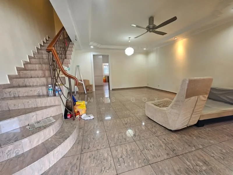 Living features: cream painted walls, polished tile flooring, 5-blade ceiling fan, recessed downlights, large window with natural light, staircase with wooden railing, empty space for furniture, decorative ceiling moulding; style: modern. Room features: empty space, cleaning supplies, unmade bed, bottled water, furniture in the corner.