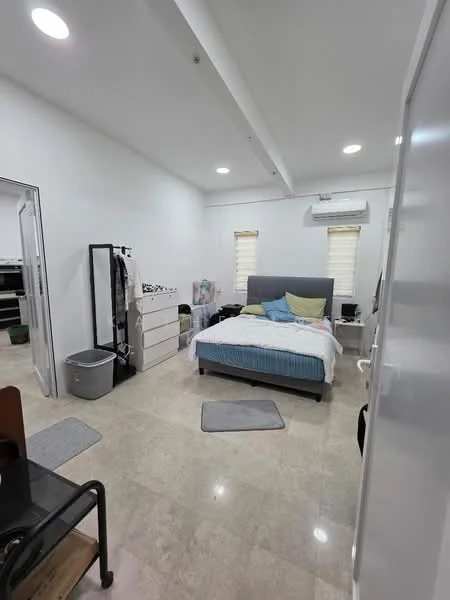 Bedroom features: queen-size bed with grey upholstered headboard, white bedding with blue and green accent pillows, 2 bedside rugs, white painted walls, marble tile flooring, 1 wall-mounted split AC unit, 2 windows with blinds, dressing mirror, white chest of drawers, clothes rack, waste bin; style: modern.