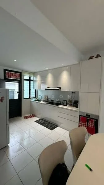 Kitchen features: white cabinetry, grey countertop, stainless-steel range hood, built-in oven, freestanding fridge, single-bowl stainless-steel sink, chrome pull-down faucet, ceramic tile flooring, recessed downlights, window with black frame, open shelving, kitchen island with seating, black mat, decorative towels; style: modern.