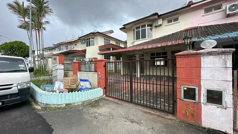 Exterior type: linked terrace house; features: red brick facade, white painted facade, gated entrance, paved driveway, manicured lawn, surrounded by palm trees, two-storey structure, front porch, fence with decorative elements; style: modern.