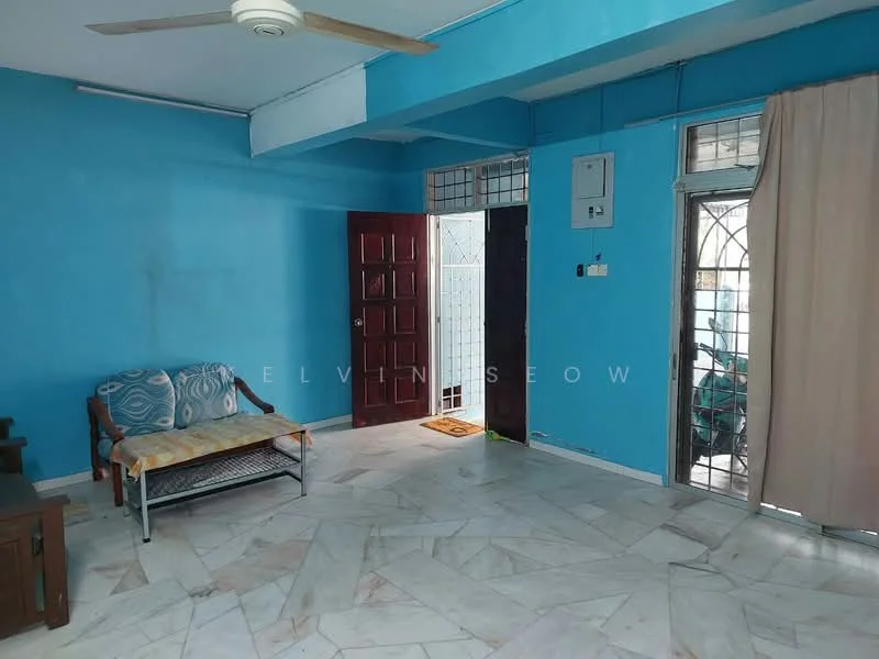 Living features: blue painted walls, marble tile flooring, ceiling fan, sofa with patterned upholstery, wooden door, glass door, curtain, window with security grille.