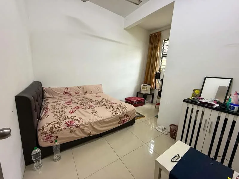Bedroom features: queen-size bed with floral bedding, white painted walls, glossy tile flooring, window with sheer curtains, built-in wardrobe, dressing table with mirror, small bedside table, decorative items on the table, water bottle on the floor.