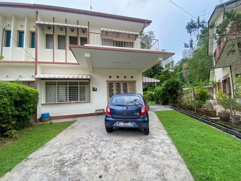Exterior type: detached bungalow; features: two-storey building, white painted facade, striped awning over windows, concrete driveway, manicured lawn, garden area with plants, front porch, visible car parked in driveway; style: traditional.