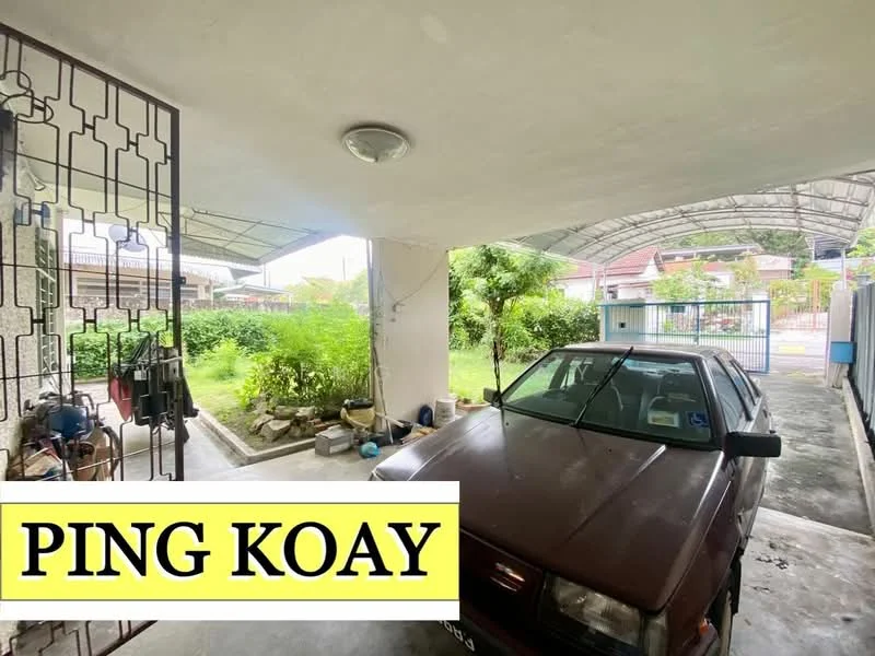 Exterior type: car porch; features: covered car porch, concrete flooring, metal gate, surrounded by greenery, driveway, outdoor lighting, fenced perimeter, adjacent to residential area; style: modern.