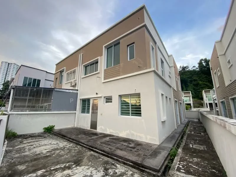 Exterior type: semi-detached house; features: two-storey building, cream painted facade, brown accent wall, large windows, concrete flooring, surrounded by greenery, side pathway, no visible roof, minimal landscaping; style: modern.