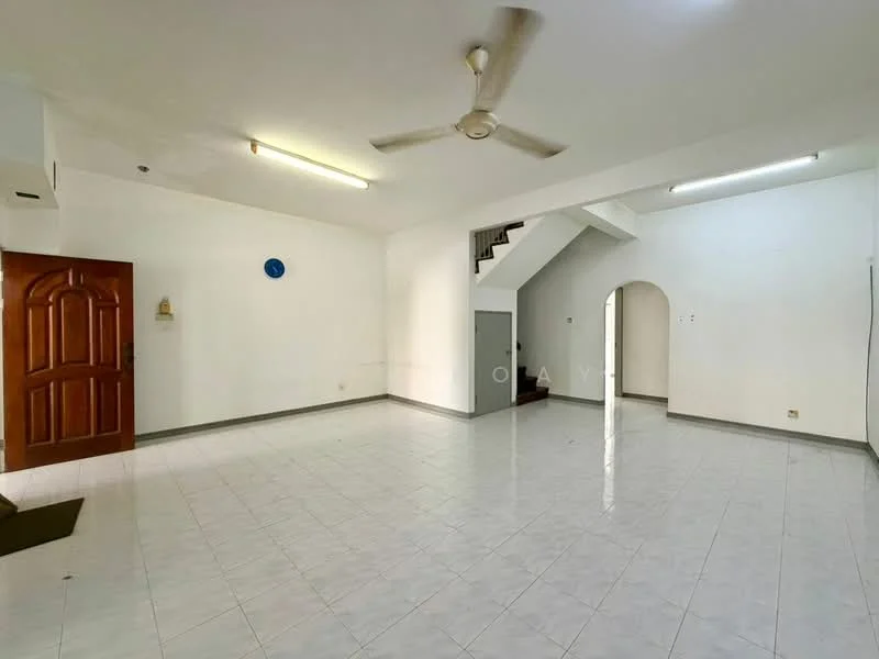 Room features: white painted walls, ceramic tile flooring, ceiling fan, arched doorway, staircase, door with wooden finish, light switch, wall-mounted electrical outlet.