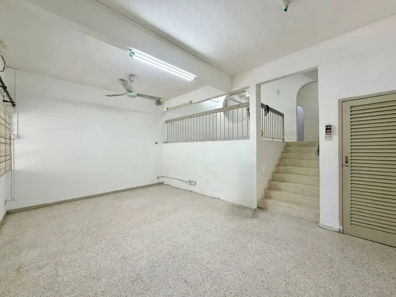 Room features: plain white walls, exposed ceiling, fluorescent lighting, ceiling fan, stone flooring, staircase leading to upper level, metal railing, air conditioning unit, built-in storage cabinet with louvered doors; style: minimalist.