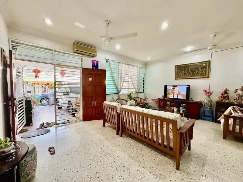Living features: 2-seater wooden sofa, 3-seater wooden sofa, coffee table, TV console, wall-mounted TV, ceiling fan, air conditioning unit, decorative wall art, window with sheer curtains, polished concrete flooring, decorative plants, wooden door, sliding glass door, open layout; style: traditional; view: street.