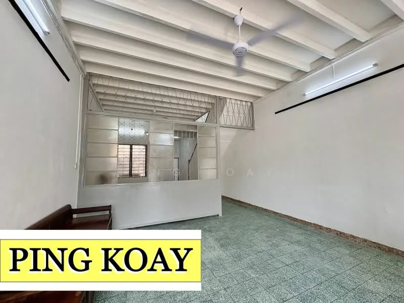 Room features: green ceramic tile flooring, white painted walls, exposed beams ceiling, ceiling fan, large window, partition wall, light fixtures, wooden bench; style: minimalist.