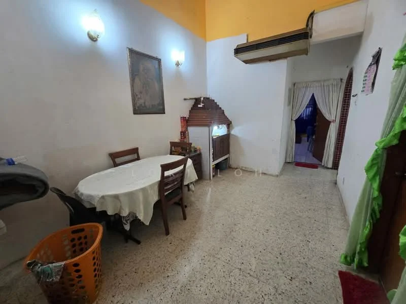 Dining features: round dining table with white tablecloth, 4 wooden dining chairs, wall-mounted light fixtures, exposed brick feature wall, cream painted walls, tile flooring, air conditioning unit, basket for laundry, doorway leading to another room, curtains at doorway.