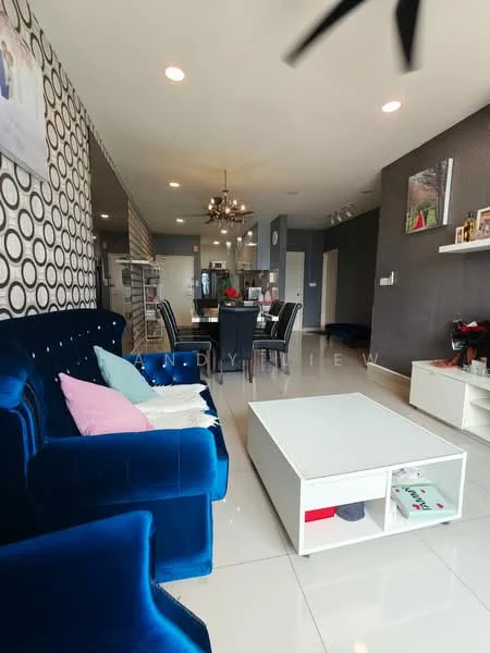 Living features: blue velvet sofa, white coffee table, decorative cushions in pink and white, wall-mounted TV, feature wall with circular pattern, chandelier light fixture, dining table with chairs, grey accent wall, polished tile flooring, open layout, shelving unit, natural light from windows; style: modern.