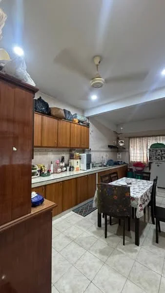 Kitchen features: wood cabinetry, white countertop, stainless-steel microwave, stainless-steel kettle, built-in oven, 4-burner gas hob, double-bowl stainless-steel sink, ceiling fan, tile flooring, table with floral tablecloth, wood dining chairs, refrigerator, wall-mounted cabinets; style: modern.