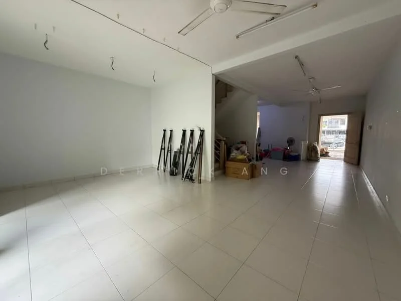 Room features: white painted walls, tile flooring, ceiling fan, multiple light fixtures, staircase visible in background, open space layout, storage boxes, folding chairs, fan, unfurnished.