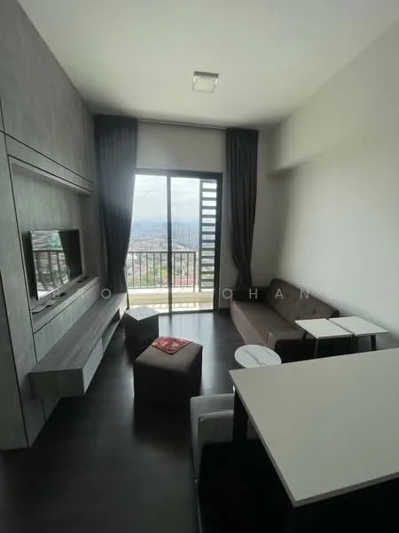 Living features: floor-to-ceiling windows, grey accent wall, dark wood flooring, sofa in brown, coffee table, TV console, wall-mounted TV, curtains, decorative cushions, view of city skyline; style: modern; view: city.