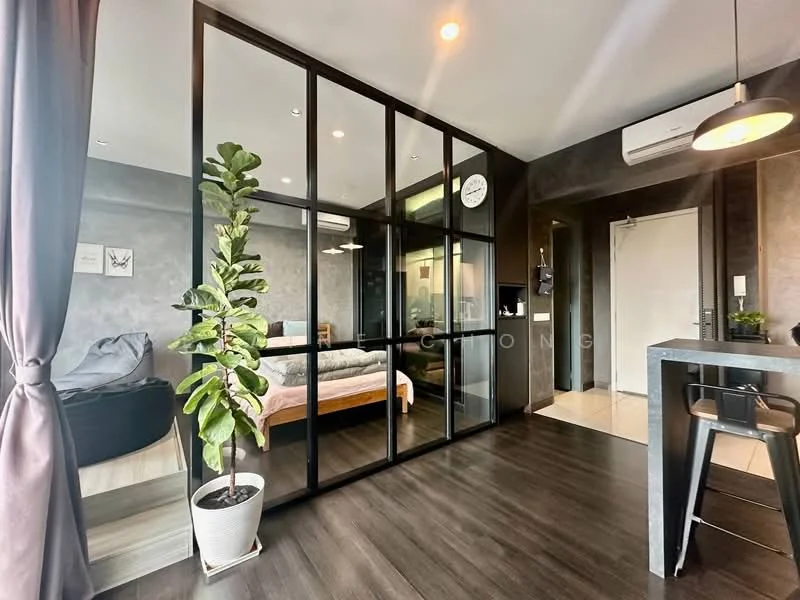 Living features: dark wood flooring, glass partition wall, grey accent wall, recessed downlights, wall-mounted air conditioning unit, clock on wall, indoor plant in pot, open-plan layout, black bar table with stools; style: modern. Bedroom features: queen-size bed with light bedding, bedside table, decorative wall art; style: modern. Kitchen features: kitchenette with countertop, built-in cabinets, refrigerator, sink; style: modern.