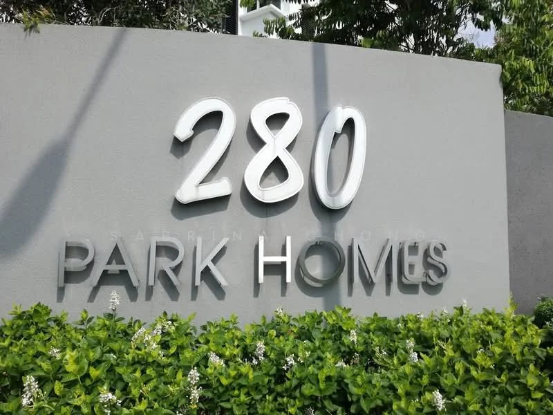 Exterior features: signage with the number 280, signage with the text PARK HOMES, grey painted wall, landscaped greenery with small white flowers; style: modern.