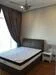 Bedroom features: queen-size bed, upholstered headboard, nightstand, floor-to-ceiling window, sheer curtains, ceiling fan, wood flooring, painted walls in neutral color; style: modern.