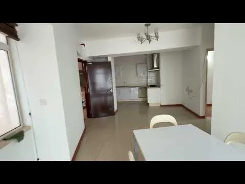 Room features: white painted walls, tile flooring, ceiling light fixture, dining table, chairs, open kitchen layout, kitchen cabinetry, stainless-steel range hood, window with view, doorway leading to kitchen, doorway leading to hallway; style: modern.