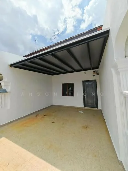 Exterior features: covered patio, concrete flooring, white painted walls, metal roof, single window, door with security grill, visible electrical wiring, open space, no visible landscaping; style: modern.