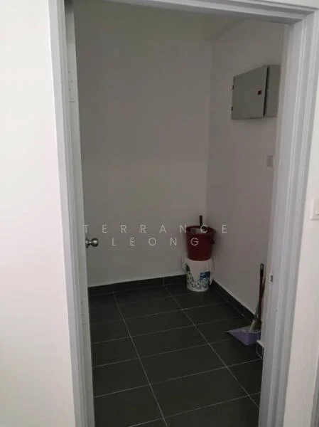 Room features: grey tiled flooring, white painted walls, light switch on wall, electrical panel on wall, bucket, cleaning tools.