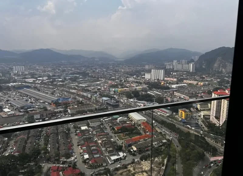 Exterior type: high-rise condominium; features: city skyline view, surrounded by mountains, glass balcony railing, urban landscape, visible parking areas, mixed-use development, high-rise buildings in the distance; style: modern.