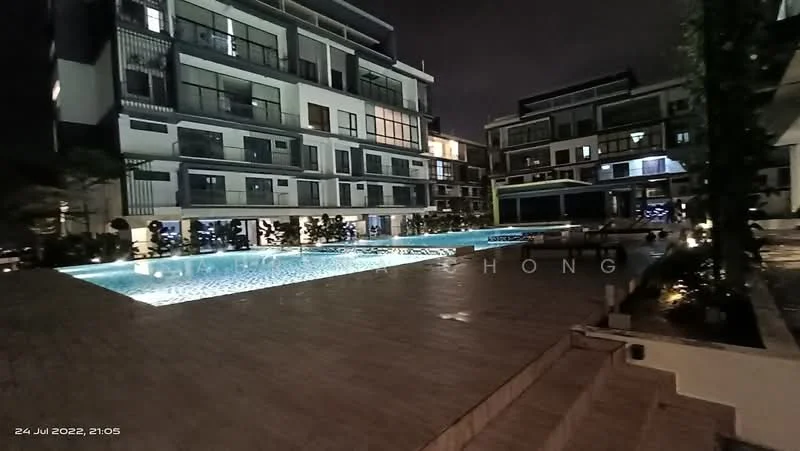 Exterior type: mid-rise condominium; features: swimming pool with illuminated water, surrounding landscaped garden, multiple balconies on upper floors, outdoor seating area, pool deck with loungers, modern architectural design, night lighting, paved walkway, greenery along the pool area; style: contemporary.