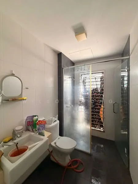 Bathroom features: white tiled walls, black tiled flooring, glass shower enclosure, chrome shower head, toilet, sink with cabinet, mirror, window with security bars, shelf with toiletries; style: modern.