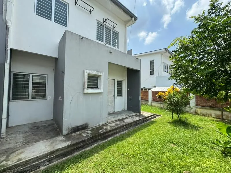 Exterior type: detached bungalow; features: white painted facade, grey accent wall, sliding glass door, windows with metal grilles, concrete patio, manicured lawn, flowering shrubs, surrounded by greenery; style: modern.