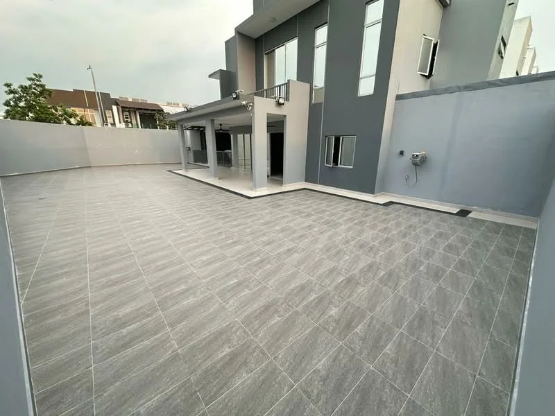 Exterior type: detached bungalow; features: grey tiled flooring, large outdoor patio area, glass sliding doors, multiple windows, concrete wall, modern architectural design, overhang roof, landscaped area with trees, outdoor lighting fixtures; style: modern.