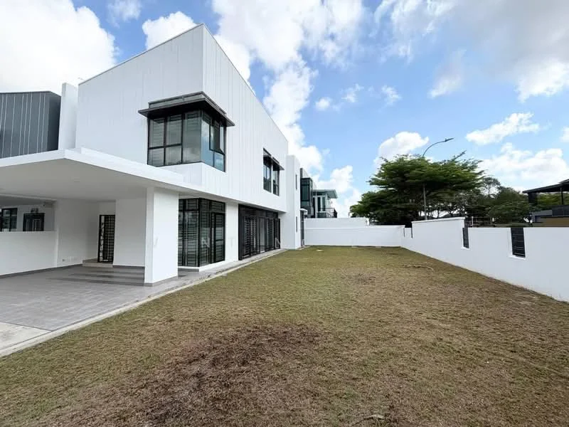 Exterior type: detached bungalow; features: white painted facade, large glass windows, flat roof, manicured lawn, paved walkway, surrounded by greenery, fenced perimeter, two-storey structure; style: modern.