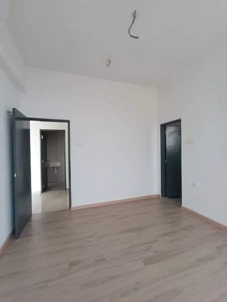 Room features: light wood laminate flooring, white painted walls, two doors leading to other rooms, ceiling light fixture, no visible furniture or decor; style: modern.