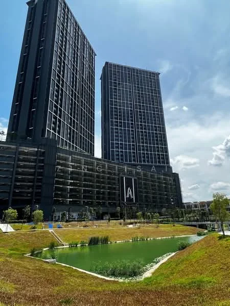 Exterior type: high-rise condominium; features: glass curtain wall, black painted facade, approximately 20-storey high-rise, manicured lawn, landscaped garden, pond with greenery, surrounded by mature greenery, multi-storey car park, outdoor seating area, feature signage on building; style: modern.