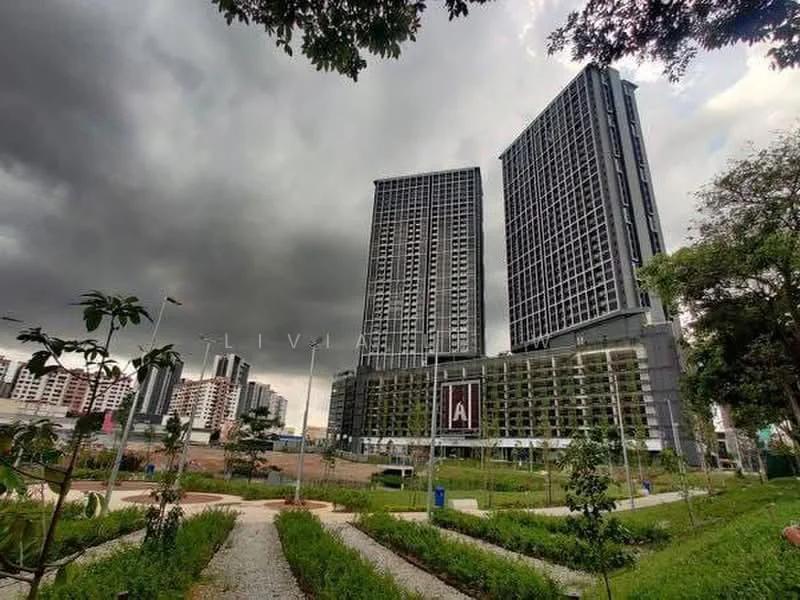 Exterior type: high-rise condominium; features: glass curtain wall, two tall towers, landscaped garden area, manicured lawn, surrounding greenery, paved walkway, urban context with nearby buildings, cloudy sky; style: modern.