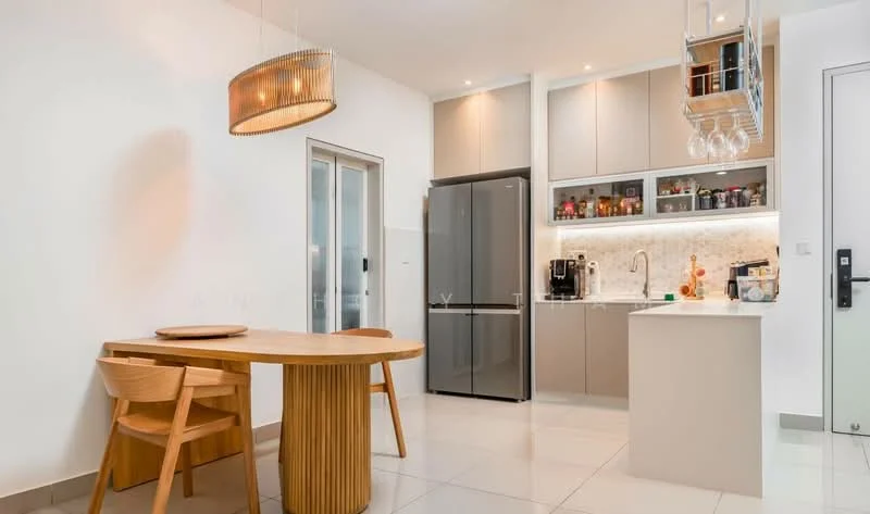 Kitchen features: grey cabinetry, white quartz countertop, stainless-steel fridge, built-in coffee machine, kitchen island, pendant light fixture, glass cabinet with wine storage, white tiled backsplash, ceramic tile flooring, dining table with wooden base, two wooden chairs; style: modern.
