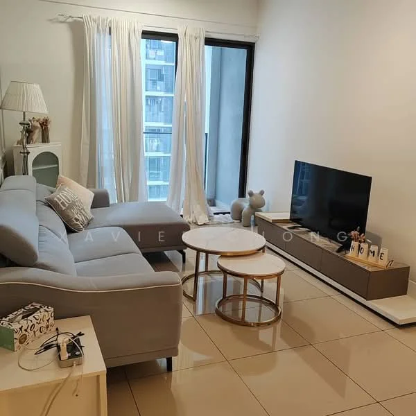 Living features: grey fabric sofa, round coffee table with gold legs, white TV console, wall-mounted TV, floor-to-ceiling windows, sheer curtains, decorative bear figurine, lampshade, ceramic decorative items, tile flooring, neutral painted walls; style: modern; view: city.