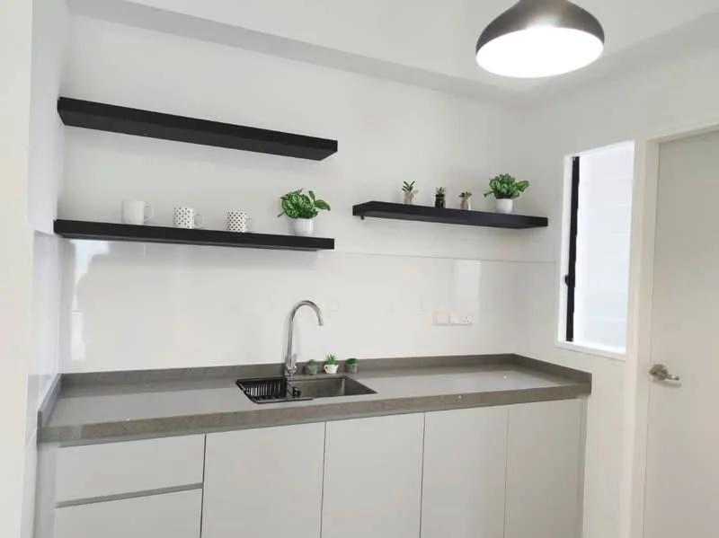 Kitchen features: grey laminate countertop, single-bowl stainless-steel sink, chrome pull-down faucet, white cabinetry with flat-panel design, black open shelving, decorative plants on shelves, white tiled backsplash, window with natural light; style: modern.