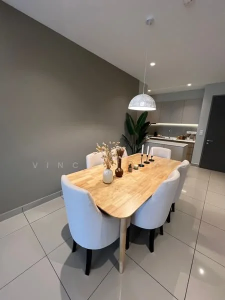 Dining features: wood dining table, 6 upholstered dining chairs in white, pendant light fixture, decorative vase with dried flowers, candles on the table, green plant in corner, grey painted walls, glossy tile flooring; style: modern. Kitchen features: kitchen cabinetry, countertop, stainless-steel appliances, open layout to dining area; style: modern.