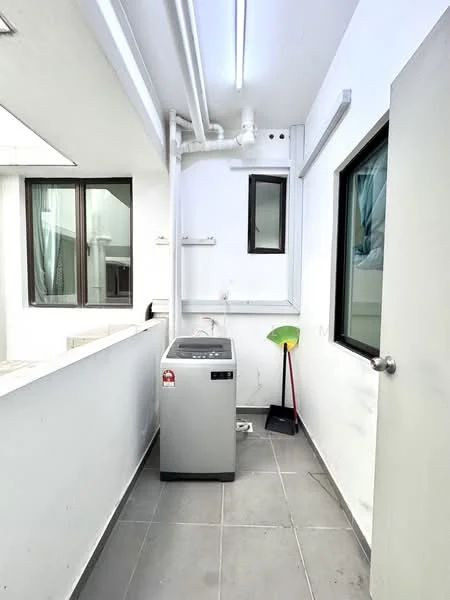Laundry features: washing machine, grey tile flooring, white painted walls, single window, pipework on ceiling, utility sink, sliding door, broom, cleaning supplies, light fixture; style: modern.