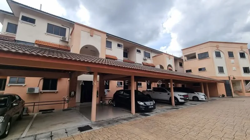 Exterior type: linked terrace house; features: two-storey building, cream painted facade, red tiled roof, covered car porch, parking spaces for multiple vehicles, visible air conditioning units, textured stone paving, windows with grills; style: modern.