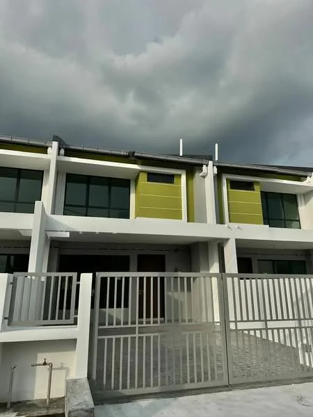 Exterior type: linked terrace house; features: white painted facade, green accent panels, large windows, flat roof, two-storey structure, metal railing, concrete driveway, gated entry; style: modern.